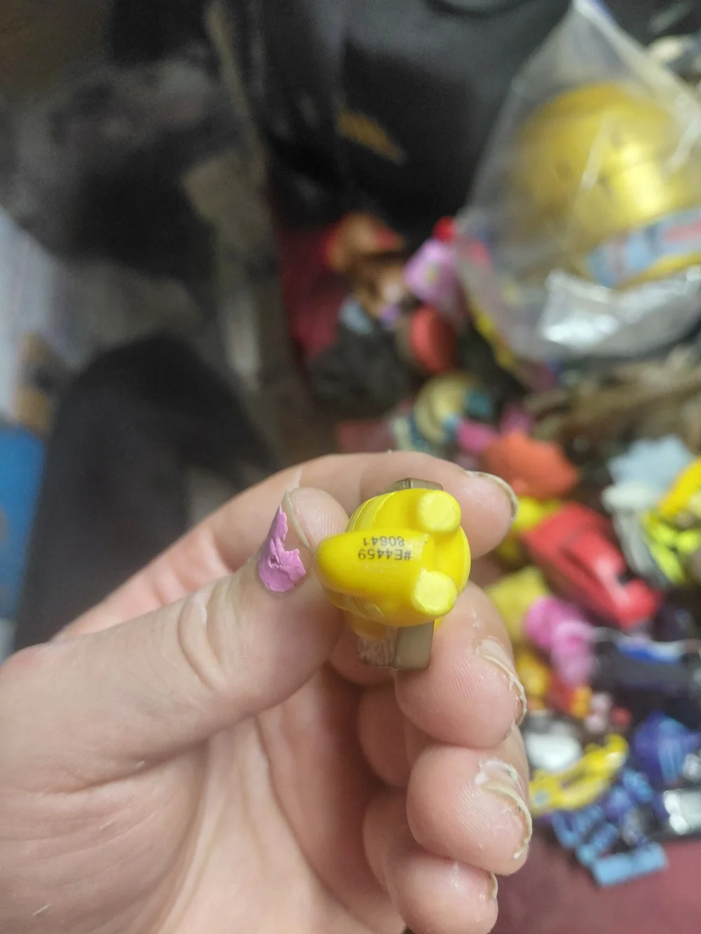 figurine is Loafy, a character from the collectible Hasbro Lost Kitties Series 1